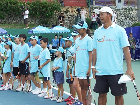 Withaya Samrej (right) conducts the tennis clinic at the Dusit Thani hotel, Pattaya, Saturday, Feb. 11. 