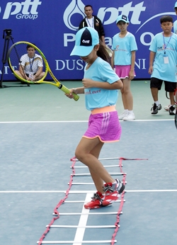 The young tennis stars are put through their paces. 