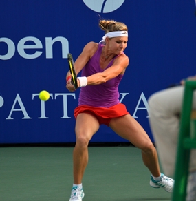 Maria Kirilenko hits a return on her way to winning the first set tie-break.
