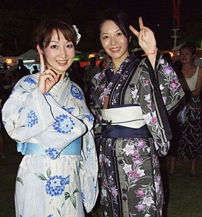 Lovely women dress in traditional Japanese kimonos.