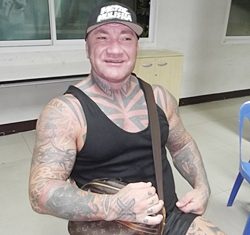 New Zealand wrestler Timothy John Ward was charged with assault over a fight with a Canadian who dissed him over his tattoos.