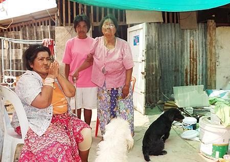 (L to R) Thongsuk Narinthorn, Oradee Sakolyuth and Waeth Narinthorn appeal for help.