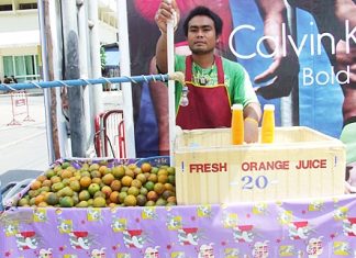Adisak Chinnok sells freshly squeezed orange juice with only a few additives.