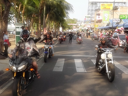 The big bike parade turns heads down Beach Road. 