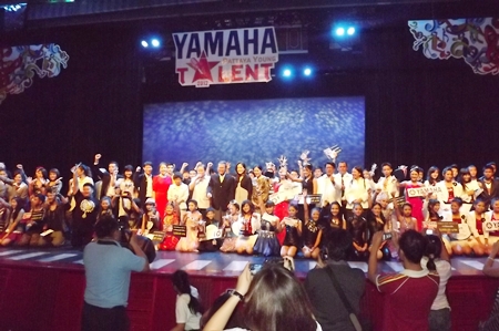 Sponsors and contestants pose for a group picture.