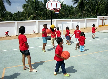 The children at the center make good use of the new sporting equipment. 
