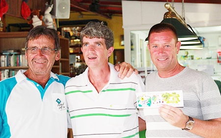John Cogan (centre) with Tuesday’s scramble winners Dennis (left) & Martin (right).