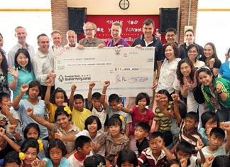 Karl Morsbach (6th left), Chairman and Founder of Baan Gerda Project recently received a donation cheque for 1.4 million baht from Pierre Andre Pelletier (3rd left), GM of the Amari Watergate Bangkok and Matthias Pfalz (8th left), President of BMW (Thailand) Co., Ltd. The Funds were part of the 3.3 million baht raised from “The 14th Amari Watergate & BMW Group Thailand Midnight Run” and “The 15th Aerobic Marathon on AIDS” to support the HIV orphanage in Lopburi Province. The 1.4 million baht will be donated through HRH Princess Maha Chakri Sirindhorn to support the Chalerm Prakiat School in Lumpoon province and the other 500,000 baht already donated to support Baht for a Better Life Project.