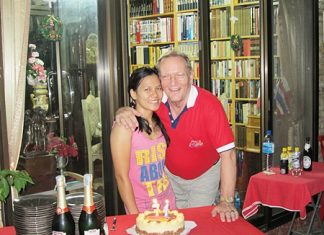 Lorena Paso (left) presents Max Rommel with a lovely birthday cake in commemoration of his birthday recently. Friends from the Rotary Club of Jomtien-Pattaya attended the celebrations to wish him many happy returns.