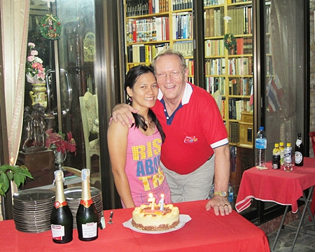 Lorena Paso (left) presents Max Rommel with a lovely birthday cake in commemoration of his birthday recently. Friends from the Rotary Club of Jomtien-Pattaya attended the celebrations to wish him many happy returns.