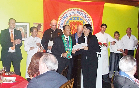 Chaîne des Rôtisseurs Bailli Ranjith Chandrasiri presents certificates of appreciations to chefs and staff.
