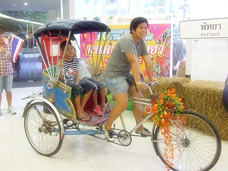 Hey kids, this is what a rickshaw is.  You don’t see many around nowadays.