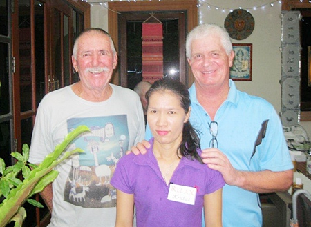 Bob Neylon and Ted Gardner with a staff member from The Relax Bar.