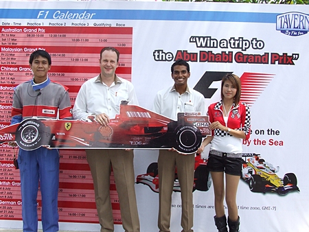 Left-right: Mangkorn Ruchansa Amari’s staff, Max Sieracki, resident manager, Sundeep Nellore, operations manager and Chancharus Trisoon, Amari’s staff, announce the prize trip to watch the 2012 Abu Dhabi Grand Prix at the end of the year. 