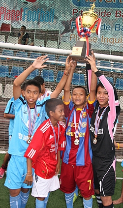 The Father Ray Children’s Home team celebrate their win.