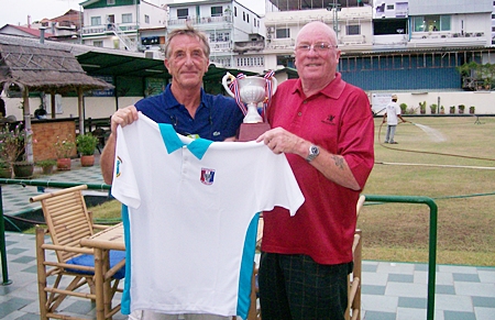 Alex receives the cup and PSC shirt from Dave. 