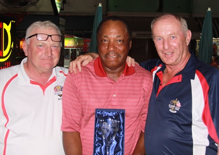 Steve Ellison and Colin Davis congratulate Ed Wyckoff (center).