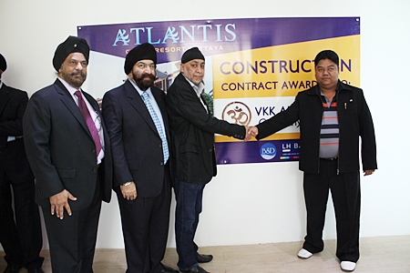 (Left-right) Directors of Blue Sky Development, Tripatpal Singh Sachdev, Popinder Singh Khanijou and Thawatchai Chawala shake hands with Worachai Pakdeesena, Director of VKK Architect, after the contract for construction of the Atlantis Condo Resort was signed on April 26.