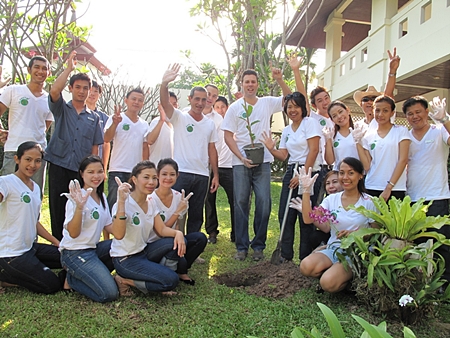 As part of the Hug-a-Tree - Planet 21 initiative, Clinton Lovell (centre), GM of the Pullman Pattaya Hotel together with his staff planted numerous trees in the hotel garden and worked together to clean the beach and roads around the hotel in their efforts to preserve the environment. Funds were also raised during the campaign which will be used to plant more than 2,000 trees in Chiang Mai through the Pur Project.