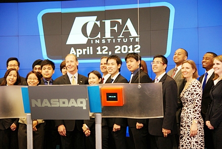 Ex-GIS student Winnie, pictured eighth from left, helps ring the Nasdaq Stock Exchange closing bell in the US.
