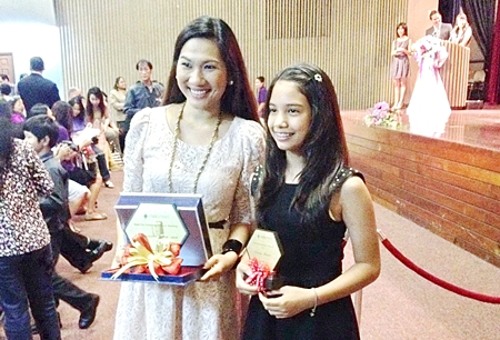 Praw poses with her teacher Kru Pearl, who also won an award.