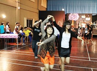 Students excitingly joining in the Scottish dance being accompanied by the school Ceilidh Band.