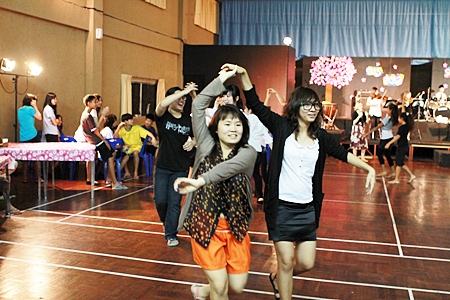 Students excitingly joining in the Scottish dance being accompanied by the school Ceilidh Band.