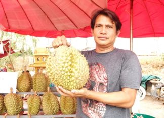 Vendor Direk Khaewdum sells his durian at the Hollywood three-way intersection in North Pattaya.