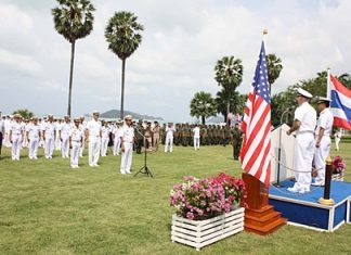 Rear Adm. Paithoon Prasopsin, commander of the Royal Thai Navy’s Frigate Squadron 2, and Rear Adm. Thomas F. Carney, commander of the U.S. Logistics Group for the Western Pacific address the troops at the beginning of the exercises.