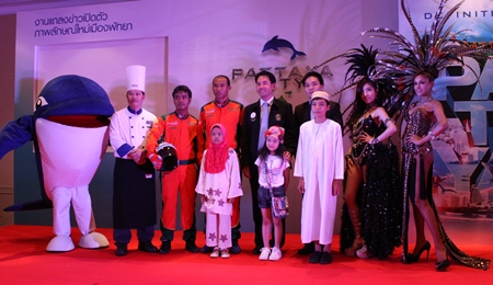 Mayor Itthiphol Kunplome poses with some of the mascots for his new image of Pattaya. 
