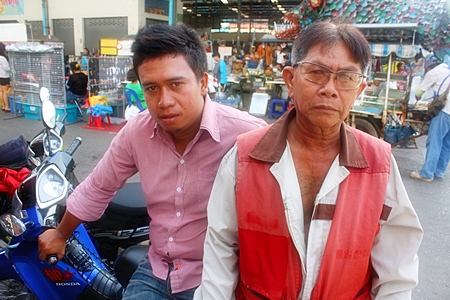 Manop Chaiyapat (left) and friend Kraisorn Poto, a motorcycle taxi rider who works around the New Naklua market, want the mayor to seriously clear drugs off the street.