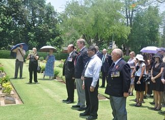 The Wreath Layers at Chungkai (from right) Maurice Hewson, the British Ambassador, Tony Archer and Fred Beavis.