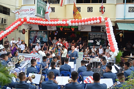 As the band plays on, Englishmen and friends celebrate St. Georges Day at the Stags Head Bar. 
