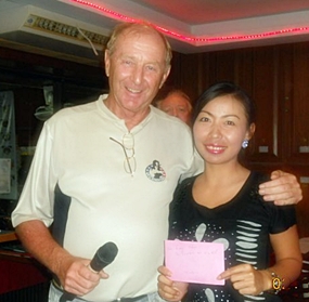 Sunday’s winner Yui Bietry with golf manager Colin Davis. 