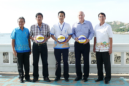 Narongchai Khunpluem, Mayor of Saensook Municipality, centre, and Geoffrey Rowe, Managing Director of Pentangle Promotions Co., Ltd., 2nd right, pose with other local dignitaries to announce the 2012 Bangsaen Thailand Open beach volleyball tournament. 