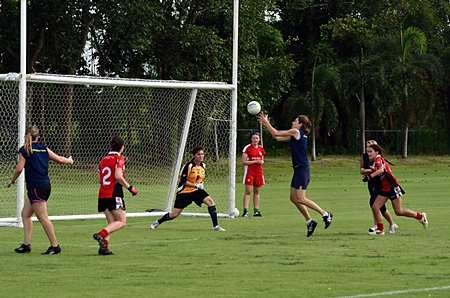 Thailand on the attack against Singapore B in the ladies Plate final.