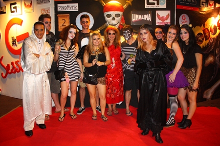 Ghosts and ghouls assemble for the “VooDoo G Session” Beach Party.