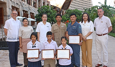 Andre Brulhart (left), GM of the Centara Grand Mirage Beach Resort, Pattaya presided over the annual Centara Grand Mirage scholarships presentation 2012 ceremony recently.  The event was organized by Daranart Nuchaikaew (2nd right), director of human resources of the hotel for the benefit of the children of hotel staff. Others attending the happy occasion included Boonmee Polyos, room attendant; Suchanya Noptakul, tailor; Thavorn Kongtangam, gardener; Thongchai Kanchentorn, technician, Daranart and Paulo De Matos (far right), executive assistant manager on rooms.