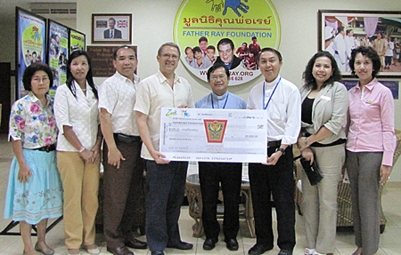 Andre Brulhart (4th left), GM of the Centara Grand Mirage Resort Pattaya presents a donation of 20,000 baht to Father Pattarapong Srivorakul (3rd right), chairman of Father Ray’s Foundation and Father Dr. Picharn Jaiseri (centre), the vice chair. The funds were raised during the 9th anniversary celebrations of Zico’s Restaurant last month.