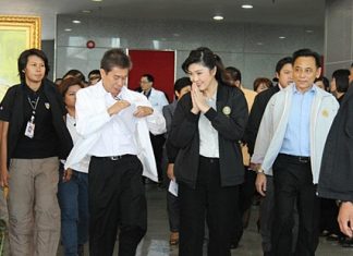 Prime Minister Yingluck Shinawatra visits Laem Chabang Port to listen to expansion plans.