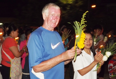 Foreigners with Thai wives perform the Wien Thien ceremony at Wat Nong Or, Central Pattaya.