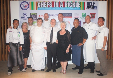 Tracy Cosgrove (2nd left) and Andrew & Adele Pickles (center) pose with the chefs that made the charity evening great.