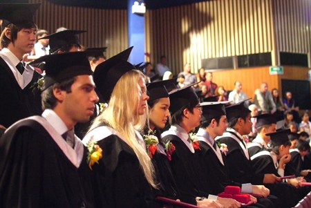 Waiting anxiously to receive the diploma.