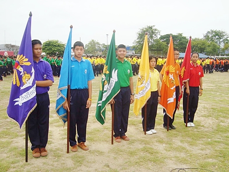 It’s flag day at Singsamut School when students receive their colored “flags of unity”. 