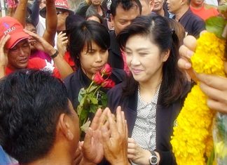 Prime Minister Yingluck Shinawatra is greeted by adoring followers as she arrives for the Kingdom’s 5th Mobile Cabinet Meeting held here in Pattaya June 18-19.