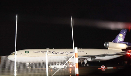A Saudi Arabian cargo plane, one of 10 flights diverted to U-Tapao, sits on the tarmac waiting clearance to return to Suvarnabhumi.