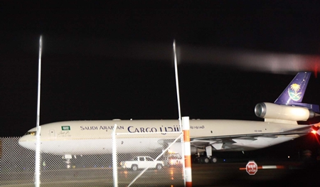 A Saudi Arabian cargo plane, one of 10 flights diverted to U-Tapao, sits on the tarmac waiting clearance to return to Suvarnabhumi. 