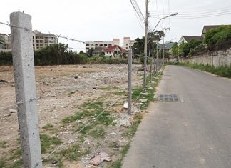 After the city finally cleaned up this area, which had been used as a free-for-all garbage dump for over a year, the owner put up a barbed wire fence to make sure it doesn’t happen again.