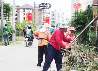 Sanitation workers clean sois and alleys around Pattaya.