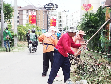 Sanitation workers clean sois and alleys around Pattaya.